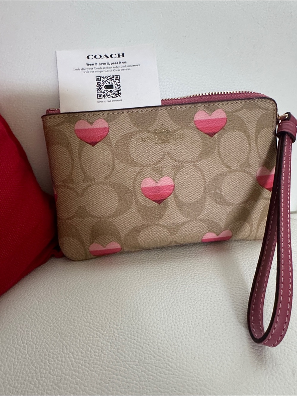 Coach Beige Signature Canvas Wristlet with Pink Heart Motif